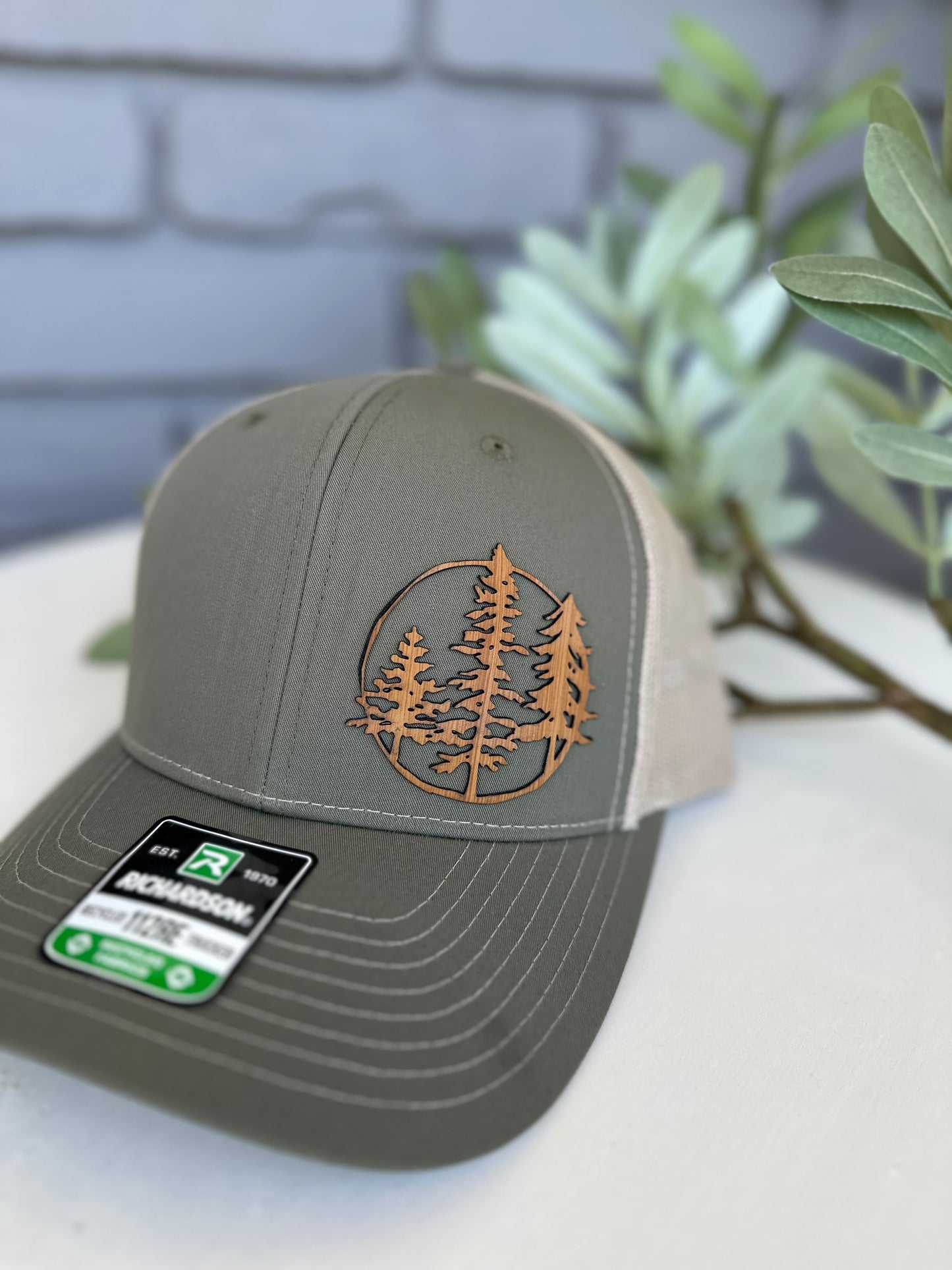 Trucker hat with 3 trees leather patch