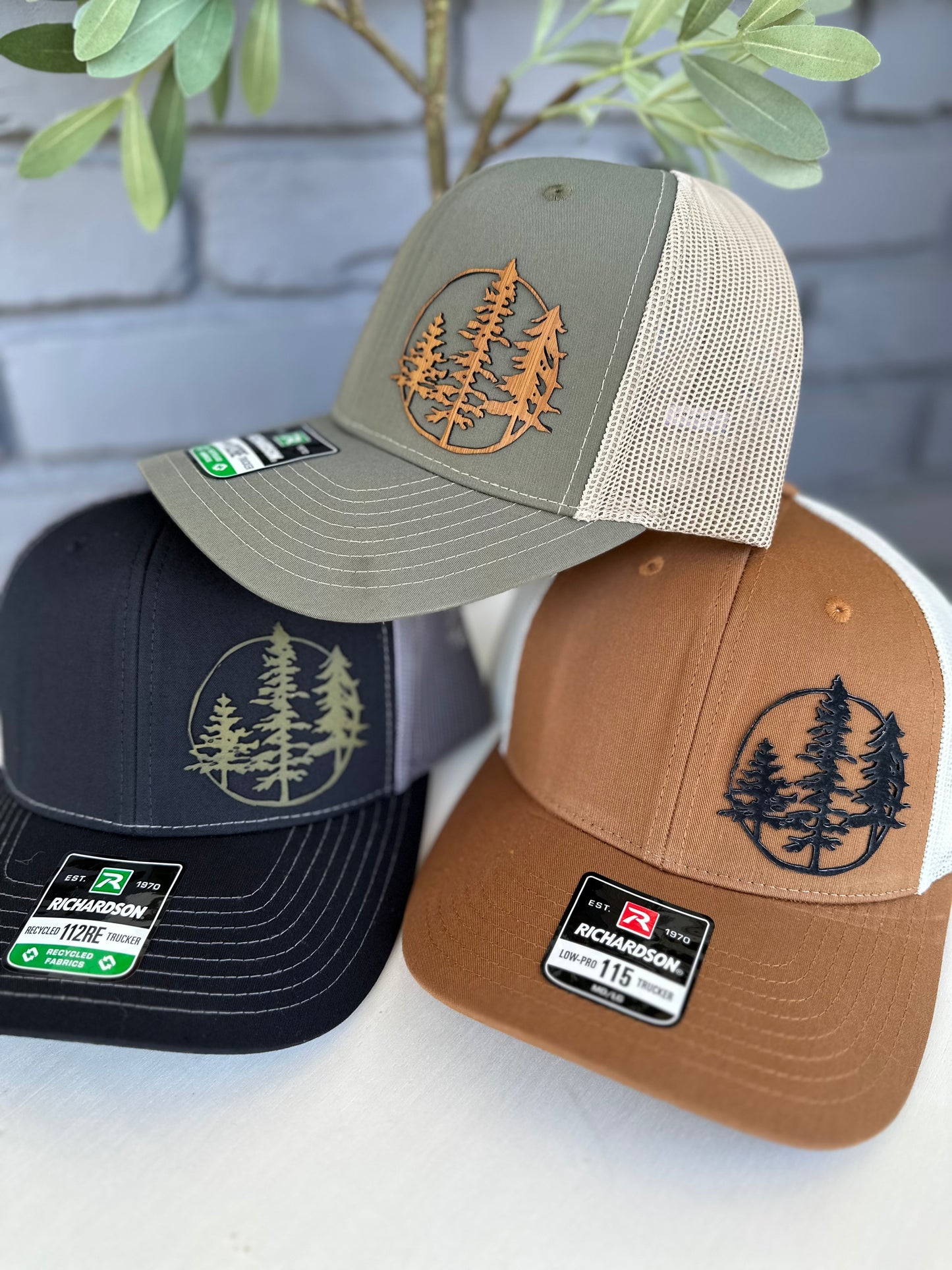 Trucker hat with 3 trees leather patch