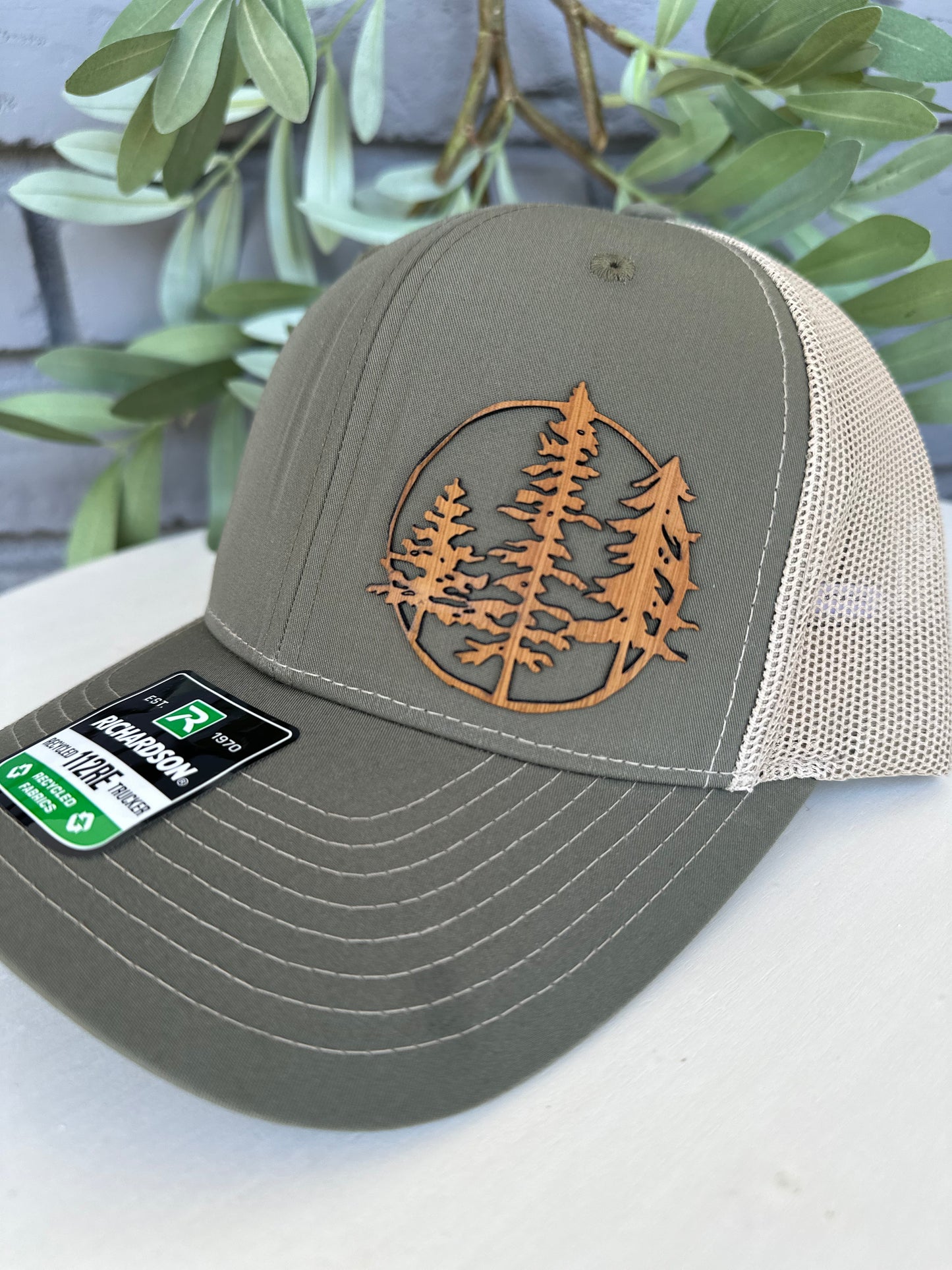 Trucker hat with 3 trees leather patch